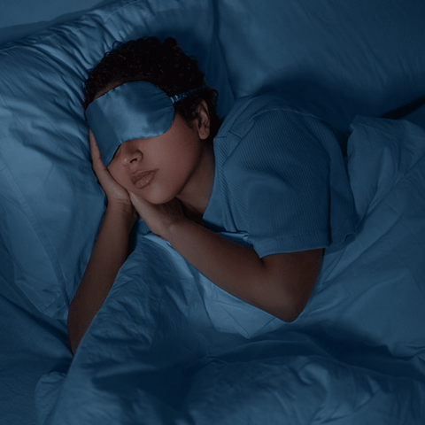 Woman sleeping with eye mask
